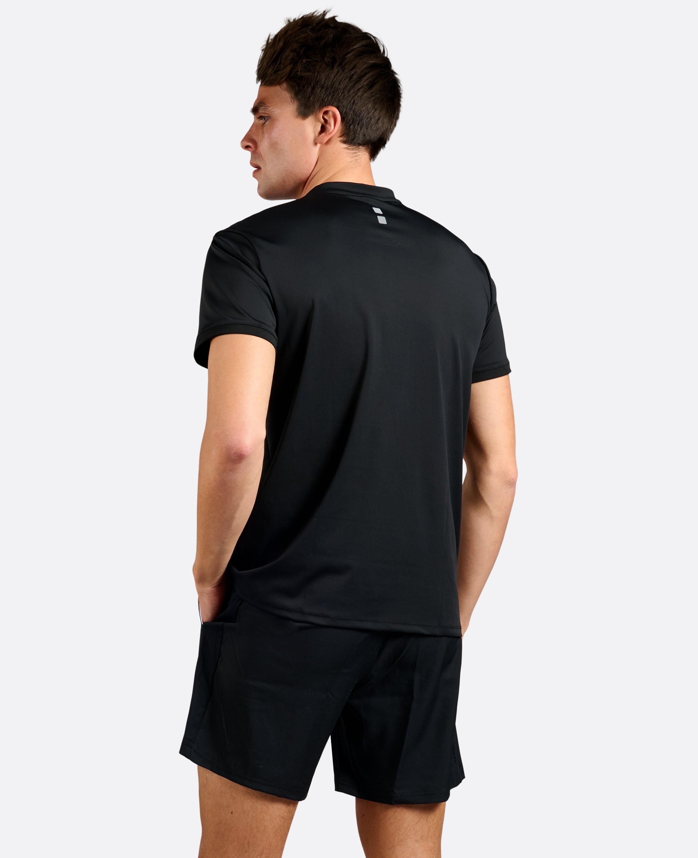 Nordicdots Pro Flex Polo Black for tennis and padel, men's apparel.