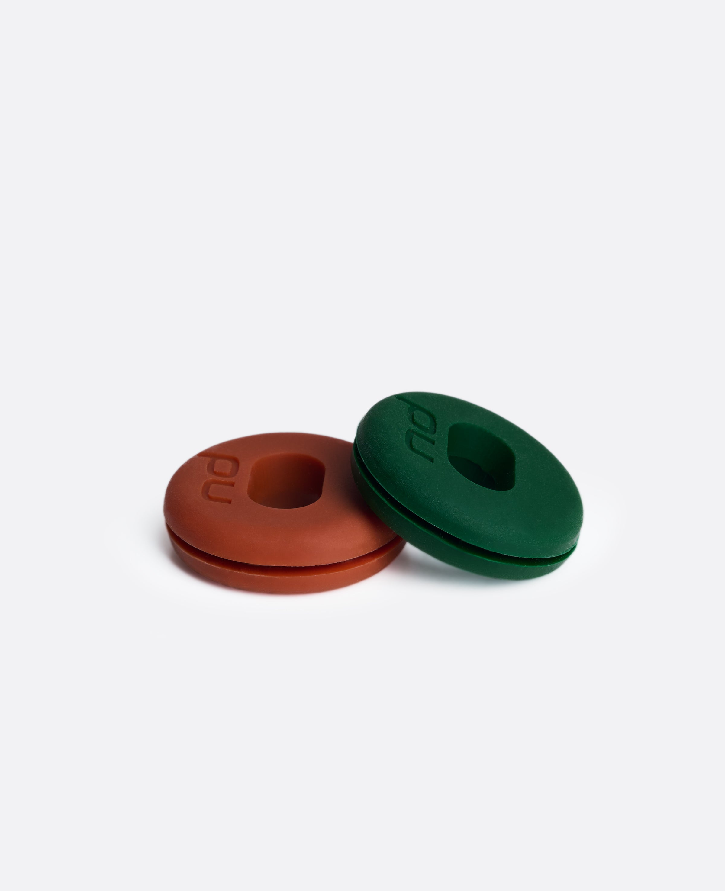 Nordicdots vibration dampeners in special clay and grass colors