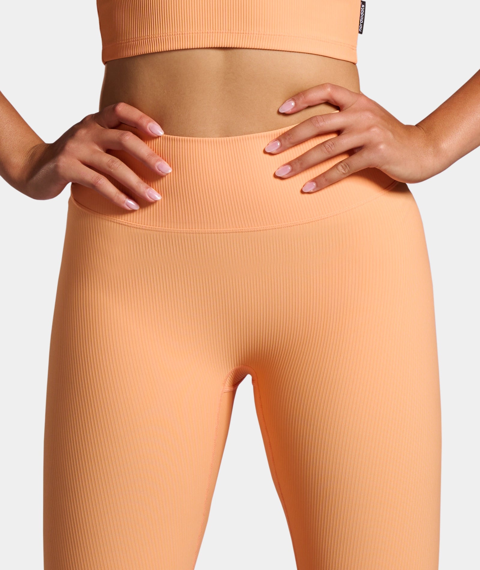 nordicdots orange ribbed leggings fitness tennis workouts padel nordicdots.com